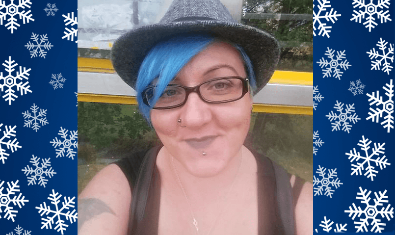 Estelle smiles at the camera